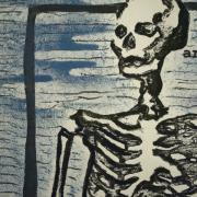 Close up of skeleton made with black ink and painted white.