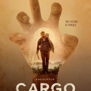 Poster for Cargo (2017): Quarantine Cinema featuring a large clawed hand in the background grabbing at Margin Freeman carrying a child.