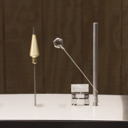 Isaac Newton vs. Rube Goldberg by 2D House