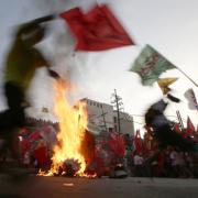 Protesters on May Day Wednesday, May 1, 2013 in Manila, Philippines. AP / Bullit Marquez